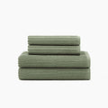 Stack Of Organic Ribbed Towels In Fern