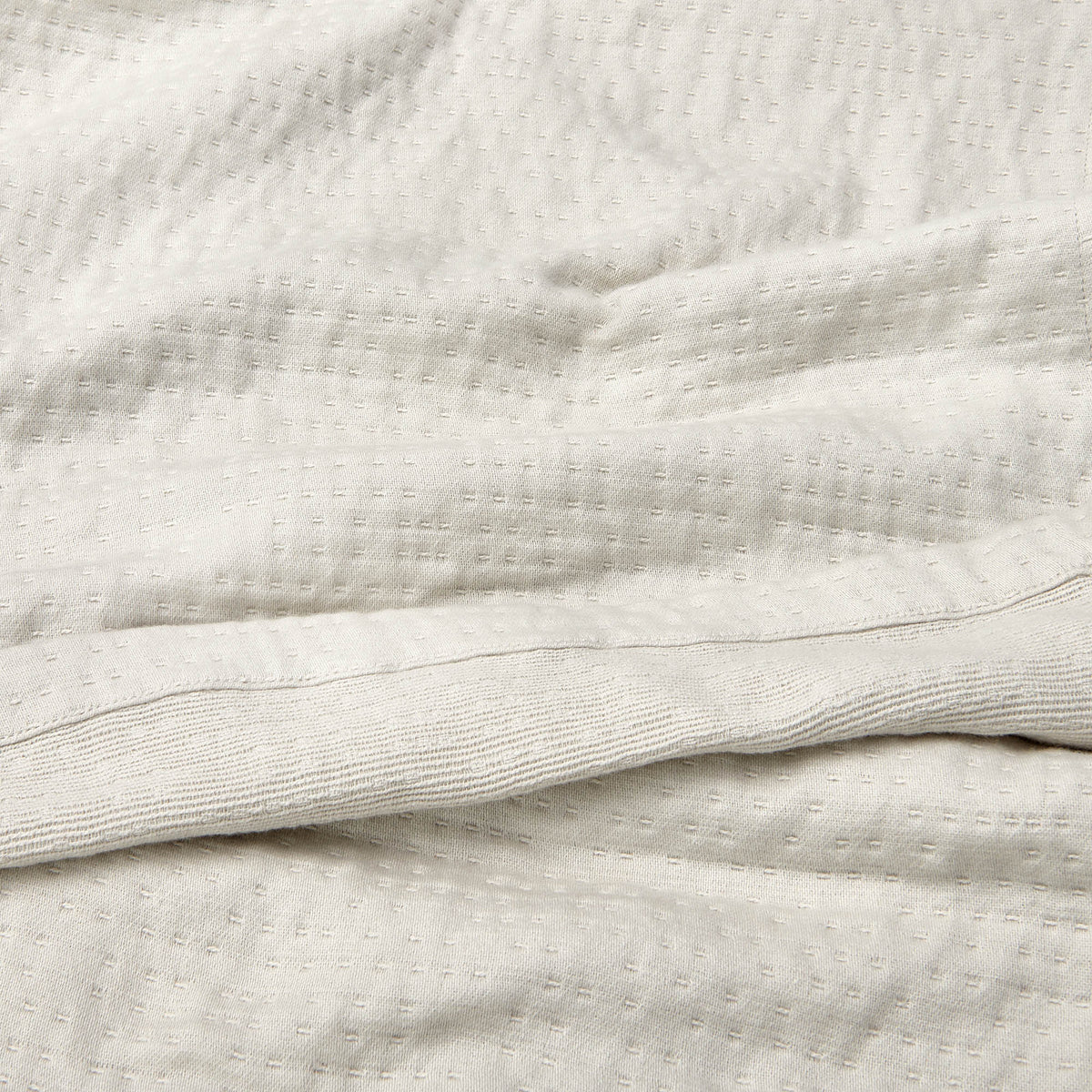 organic matelasse blanket vapour detail