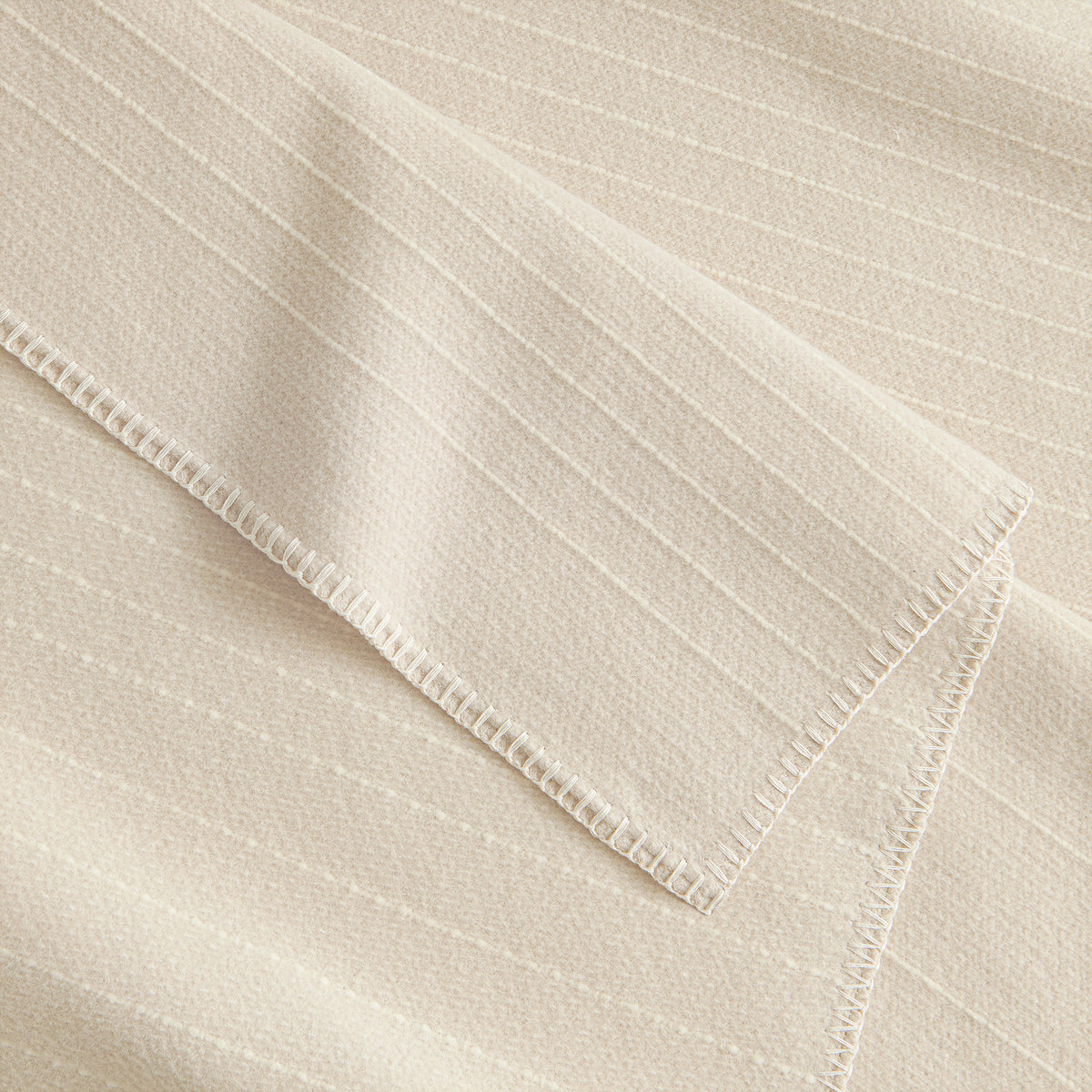 Detail Of Organic Cotton & Wool Textured Stripe Throw In Wheat