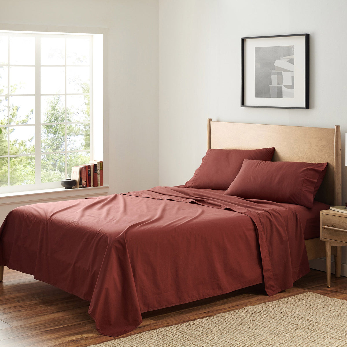 Organic Washed Cotton Flat Sheet In Brick On Bed