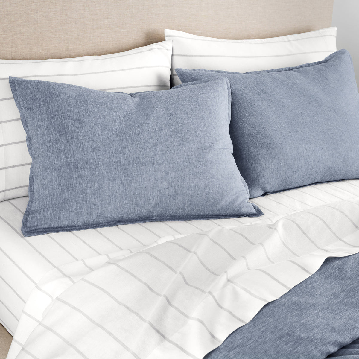 Linen Eucalyptus Pillowcase Set In Glacier Stripe On Bed