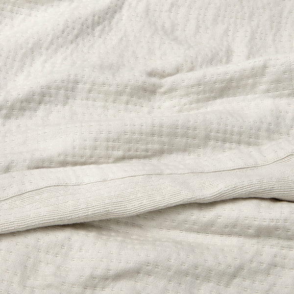 organic matelasse blanket vapour detail