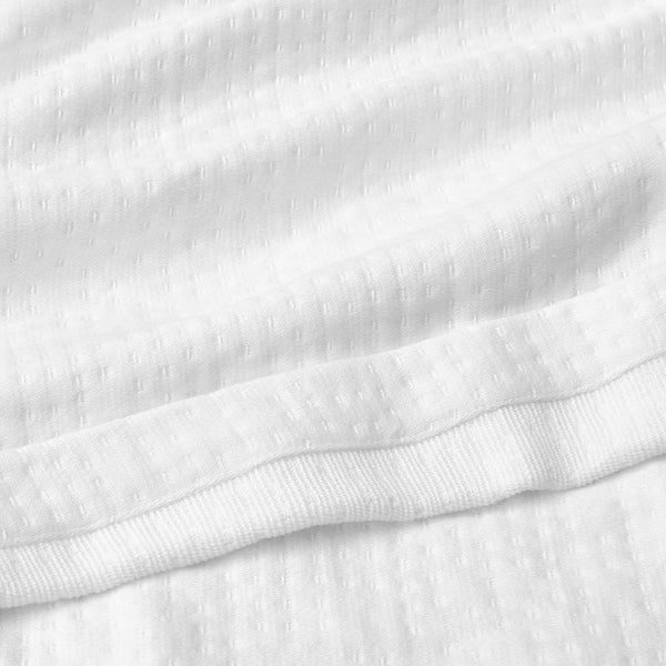 organic matelasse blanket white detail