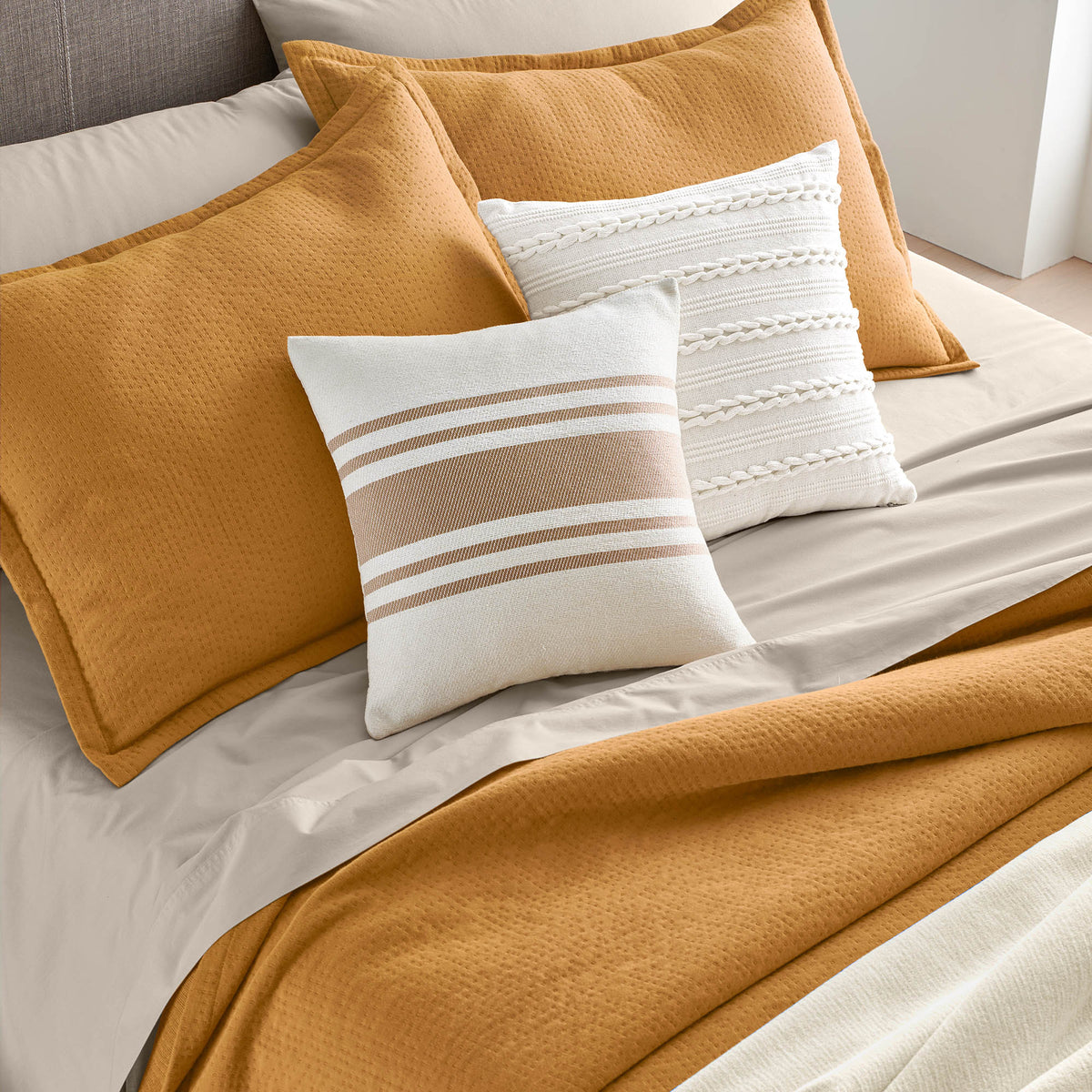 striped handmade pillow warm beige lifestyle