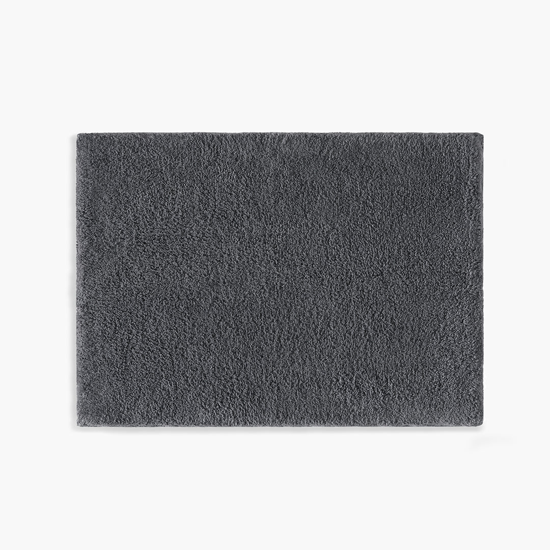 https://underthecanopy.com/cdn/shop/products/classic-organic-cotton-bath-rug-charcoal-gray_1200x.jpg?v=1684770298