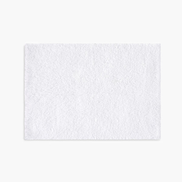 https://underthecanopy.com/cdn/shop/products/classic-organic-cotton-bath-rug-white_grande.jpg?v=1684769670