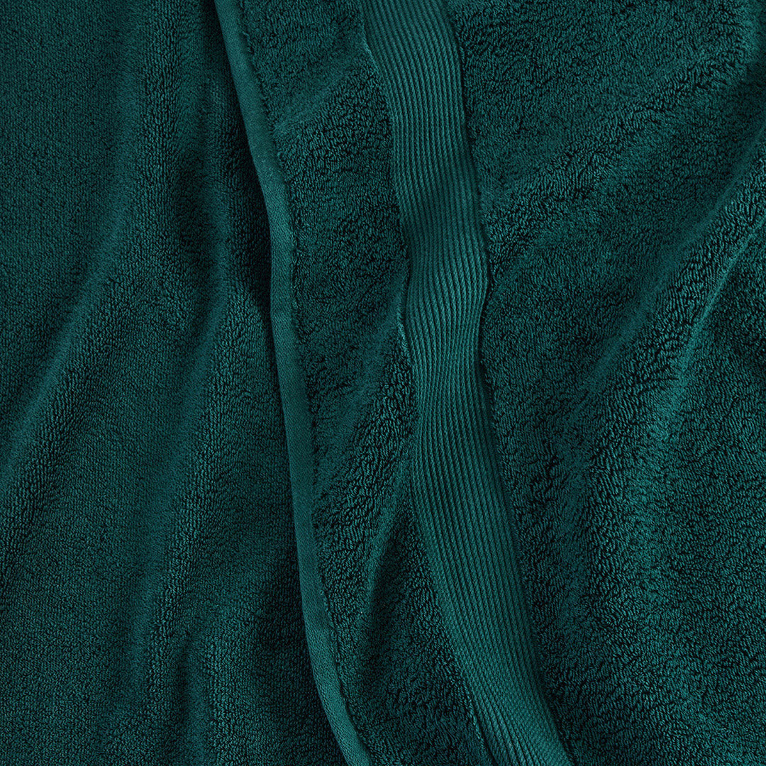 https://underthecanopy.com/cdn/shop/products/classic-organic-cotton-bath-towel-deep-teal-green-detail_1200x.jpg?v=1687377485