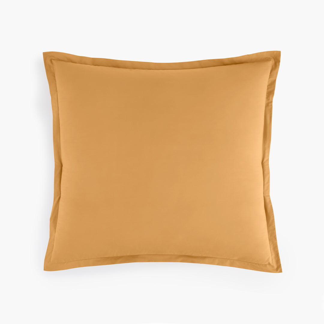 https://underthecanopy.com/cdn/shop/products/organic-cotton-percale-euro-pillow-sham-ochre-yellow_1200x.jpg?v=1687960022