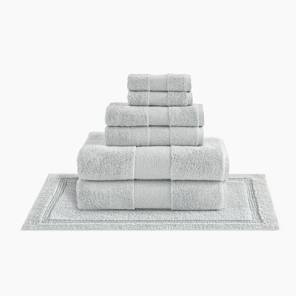 https://underthecanopy.com/cdn/shop/products/plush-organic-cotton-reversible-bath-rug-bundle-oyster-gray_grande.jpg?v=1685459040