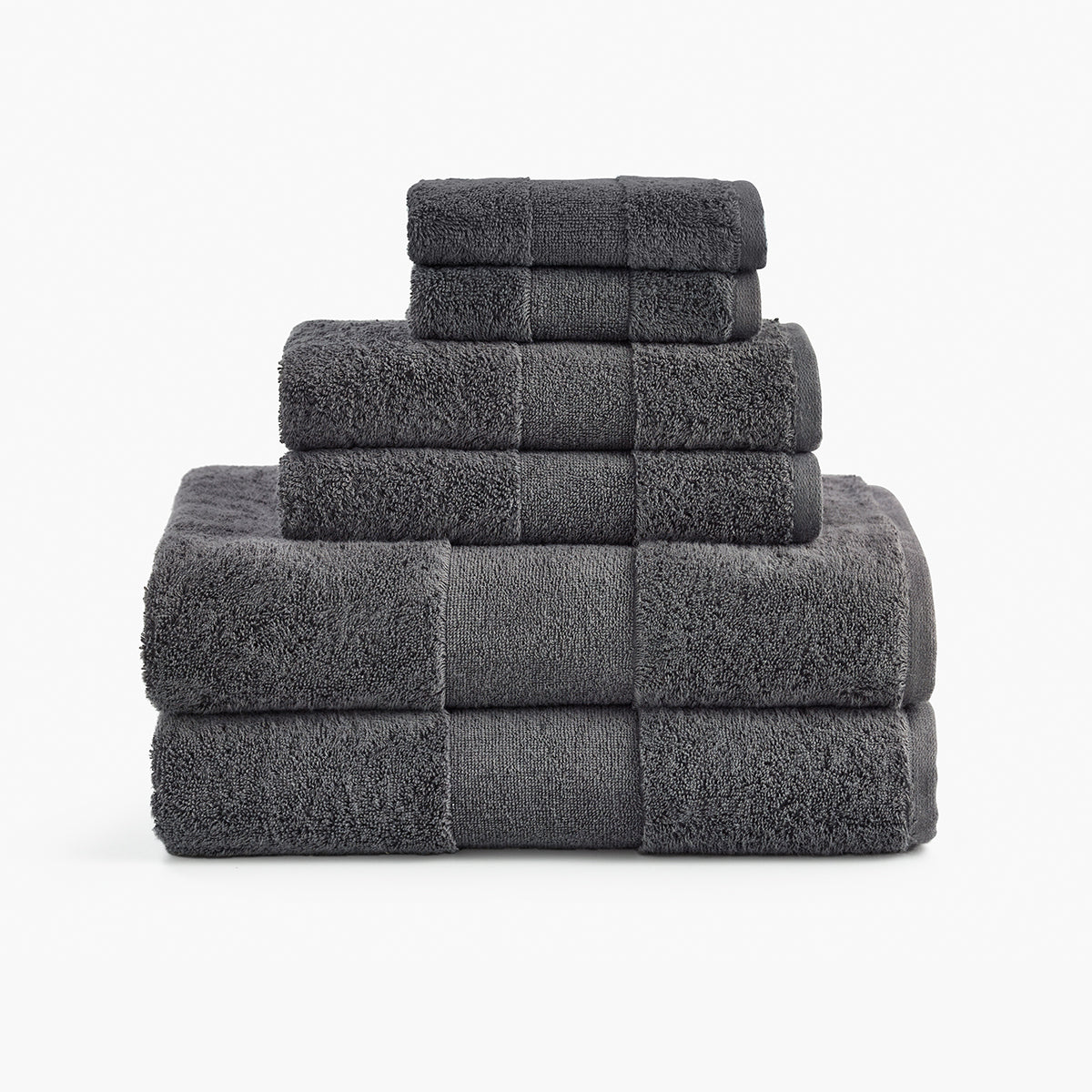 https://underthecanopy.com/cdn/shop/products/plush-organic-cotton-reversible-bath-rug-bundle-smoke-gray-towels_1200x.jpg?v=1685459145