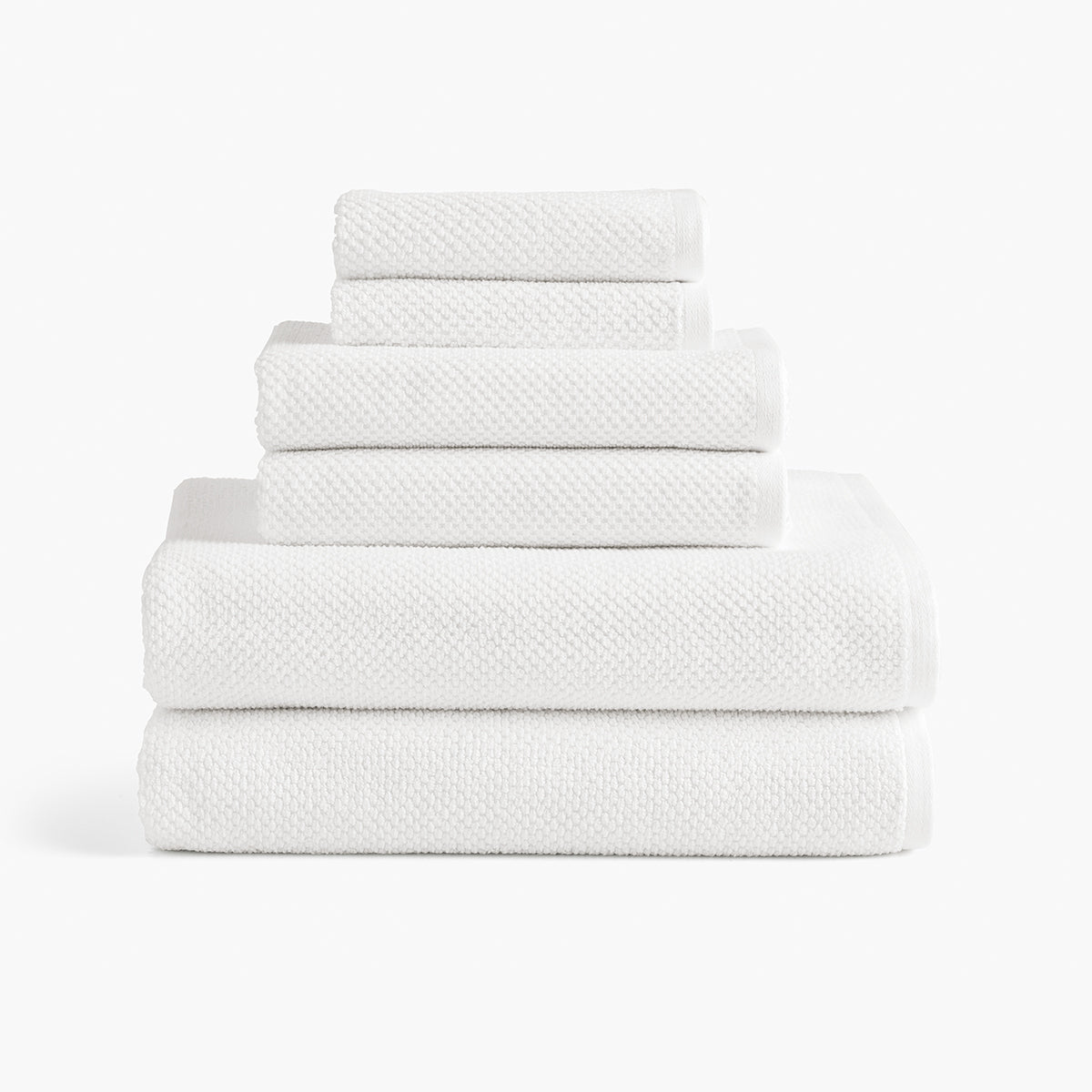 https://underthecanopy.com/cdn/shop/products/textured-organic-cotton-bath-rug-bundle-white-towel-set_1200x.jpg?v=1684789891