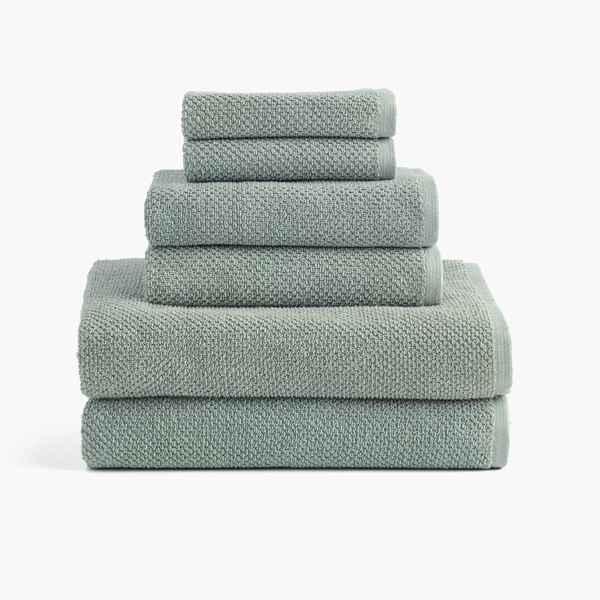 https://underthecanopy.com/cdn/shop/products/textured-organic-cotton-bath-towels-lichen-green-set.jpg?v=1684875660